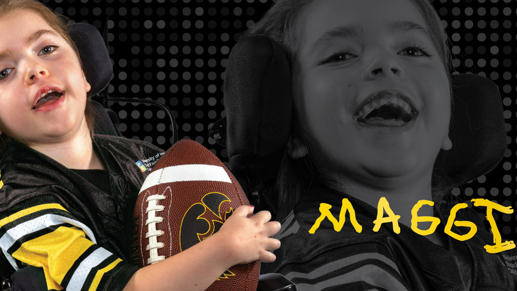 A girl holding a football