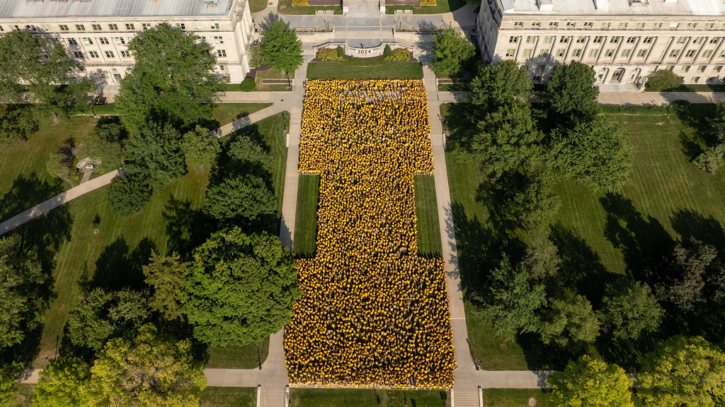 students forming a Block I on the Pentacrest lawn