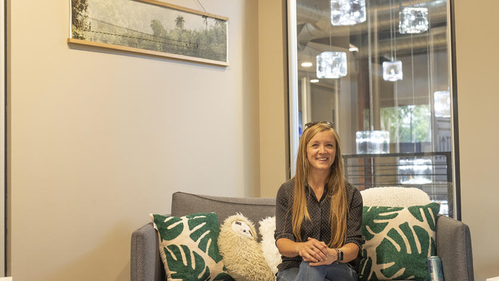 Avery Bang sitting on a couch