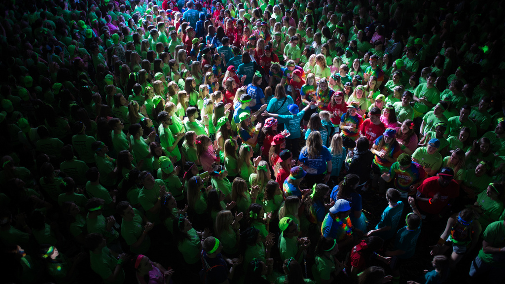 A crowd of people dancing