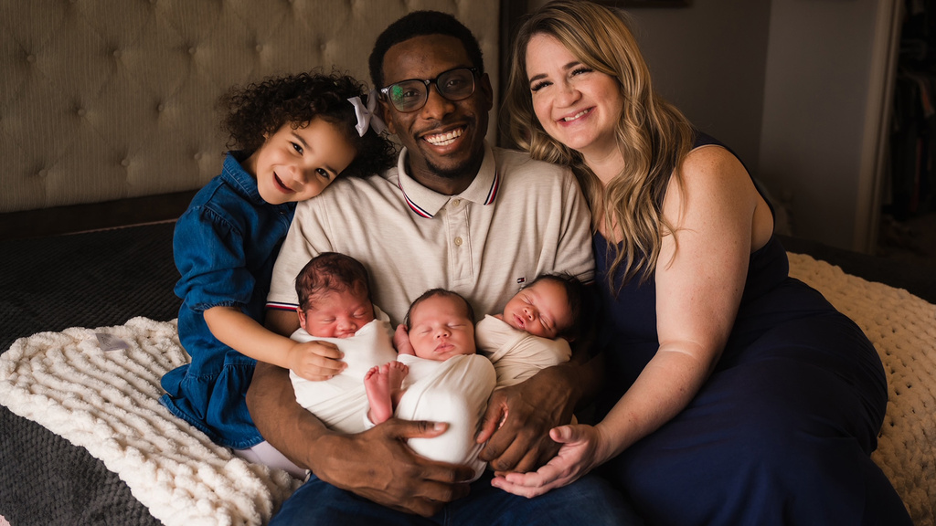 The Pinckney family — Mom and Dad with their older daughter and triplet infants