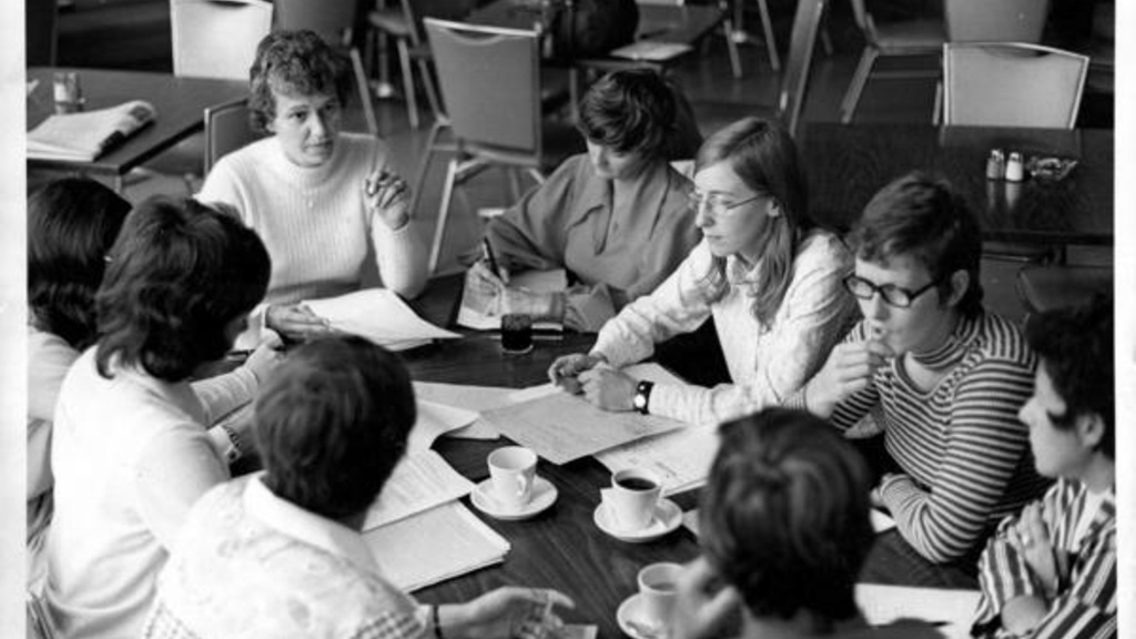 university of iowa women's athletic director christine grant meeting with coaches in 1973 archival photo