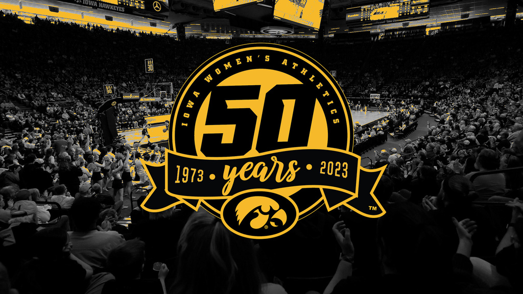 photo of carver-hawkeye arena with a logo marking 50 years of women's athletics at the university of iowa