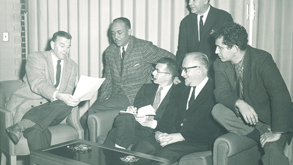 A group of people reading together