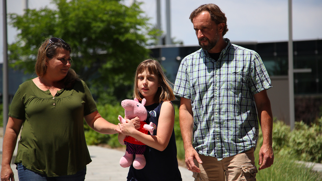 a family walking together outside