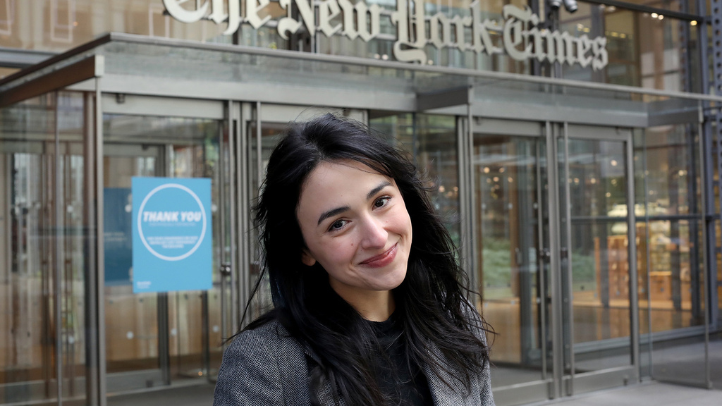 Asmaa Elkeurti standing in front of the New York Times building