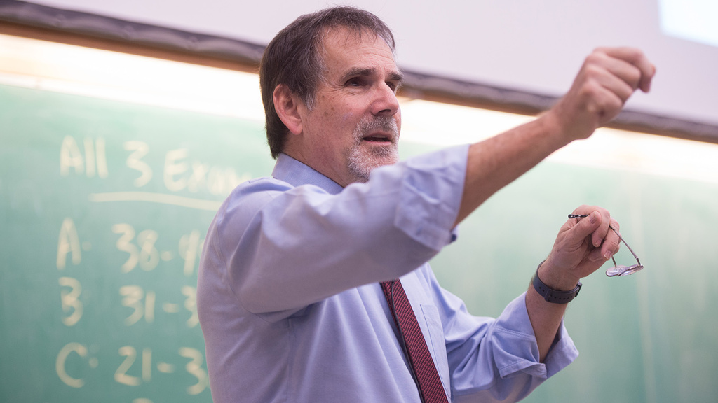 Craig Kletzing gesturing during a lecture