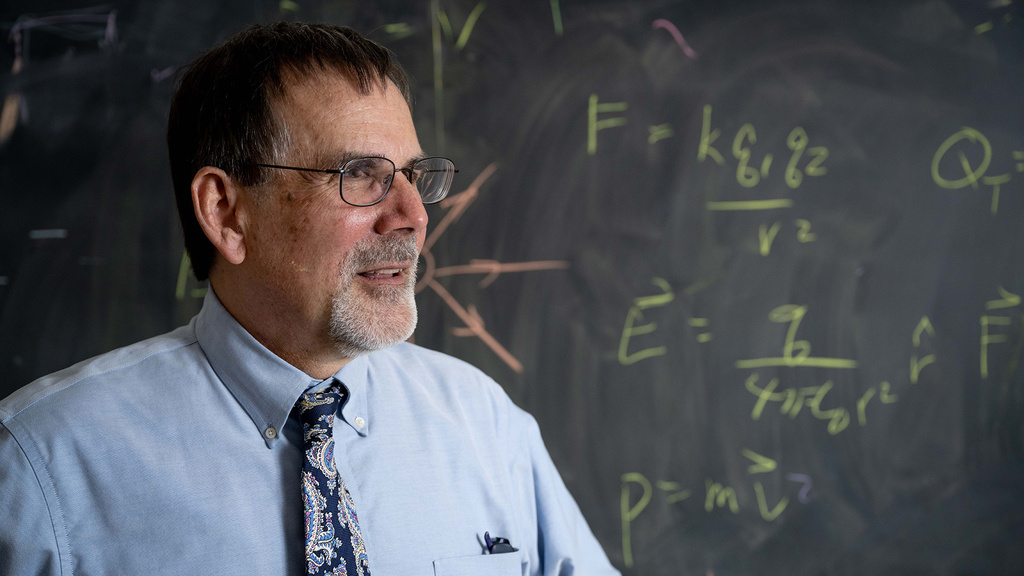 craig kletzing in front of a chalkboard