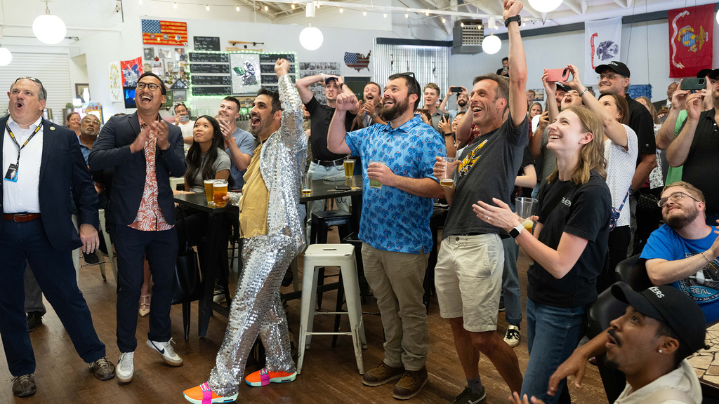 University of Iowa TRACERS team members celebrate the launch of the Falcon 9 rocket