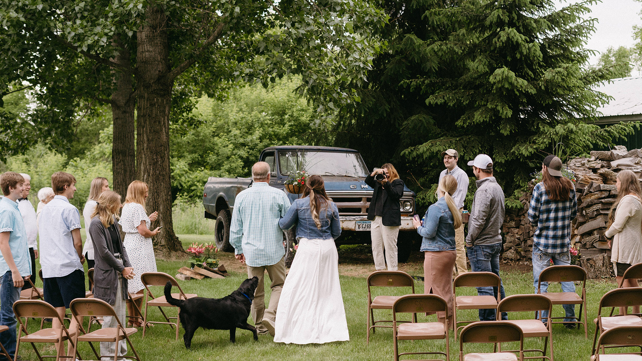 A wedding ceremony being held outside