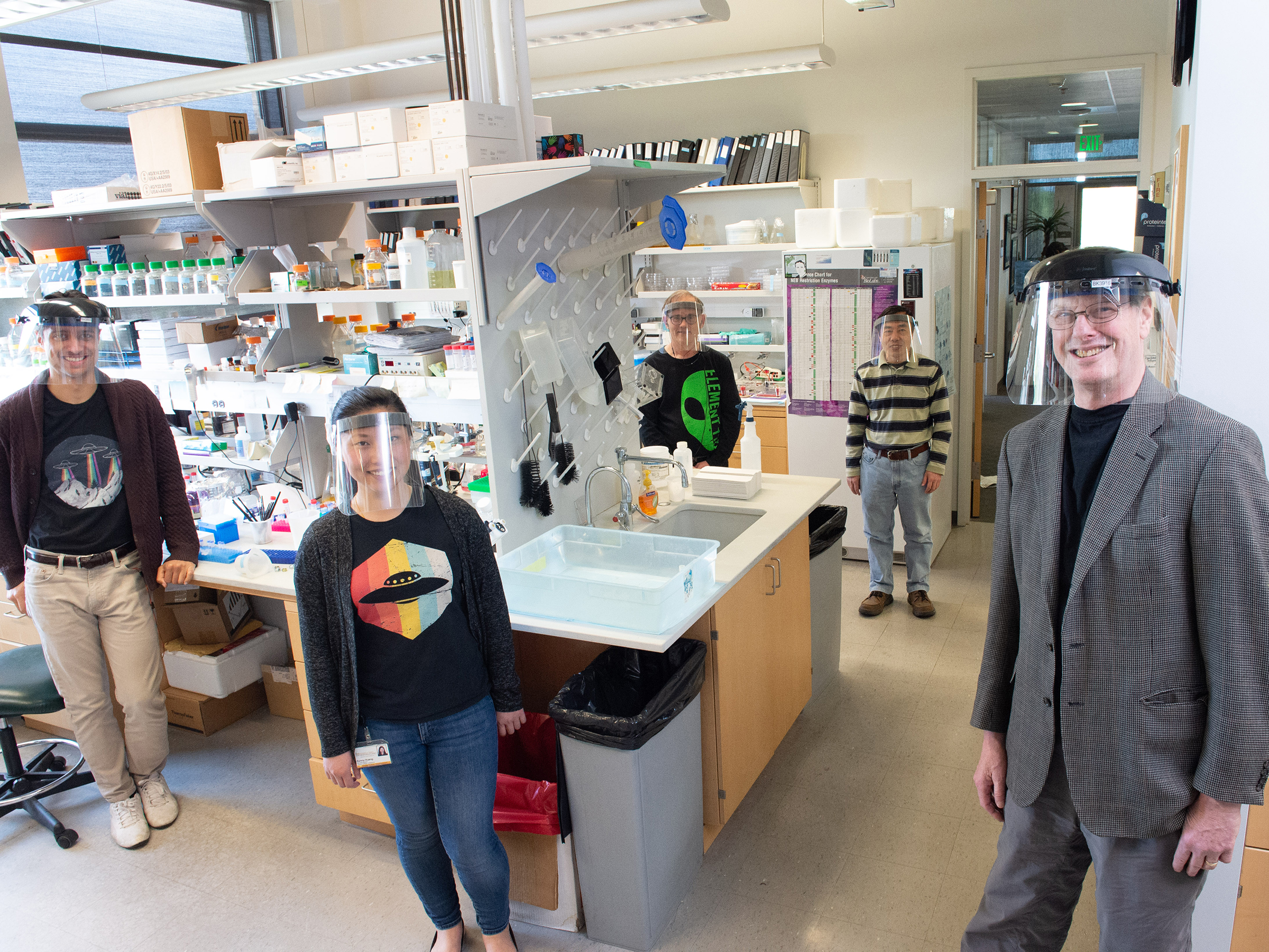 Val Sheffield (right), with members of his research laboratory (from left): Calvin Carter, Sunny Huang, Charles Searby, and Qihong Zhang. 