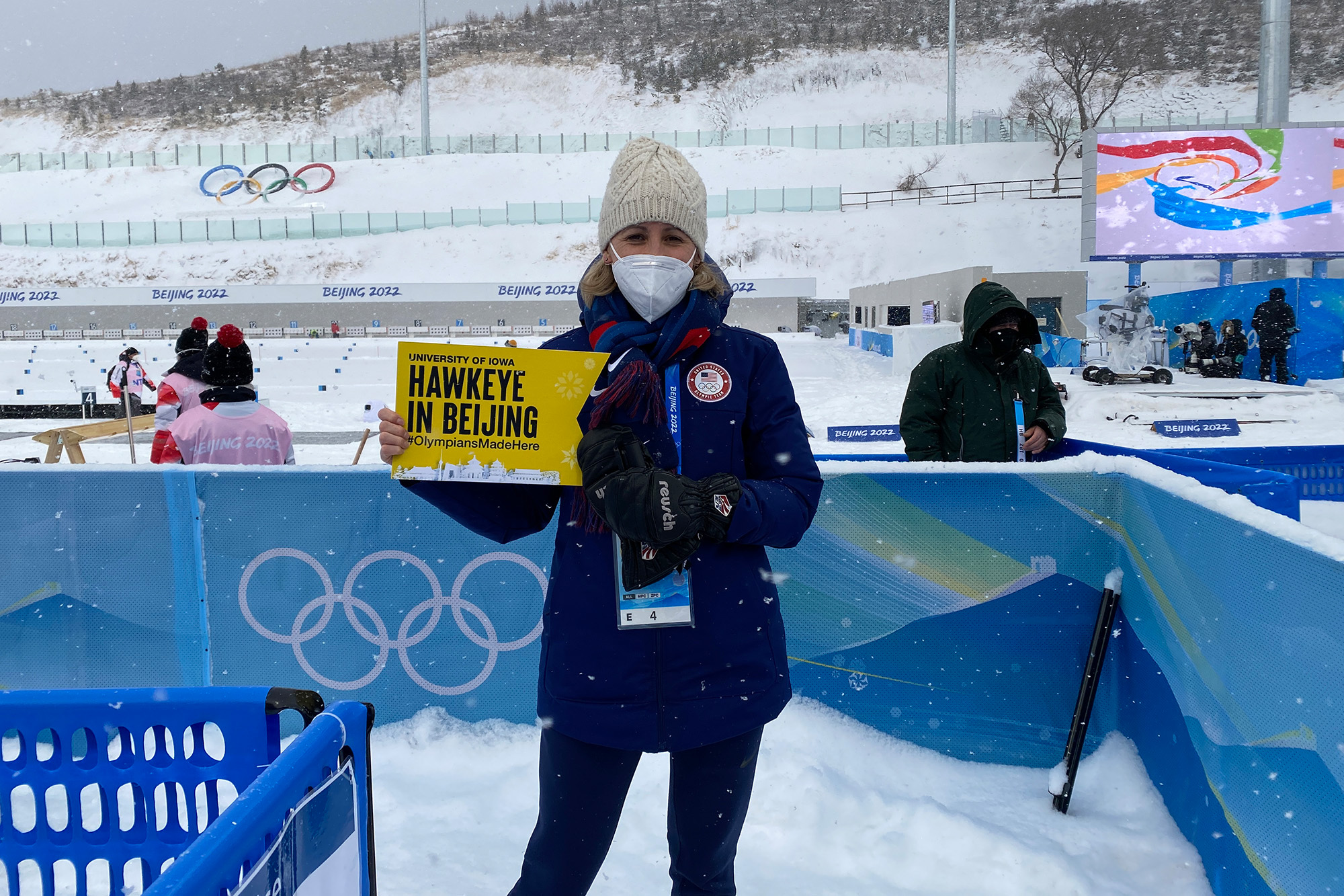 University of Iowa alumna Sarah Wilhelmi posing outdoors at the 2022 Winter Olympics in Beijing