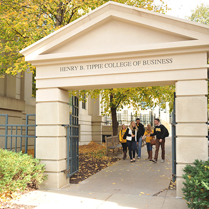 students in the courtyard area of the university of iowa tippie college of business