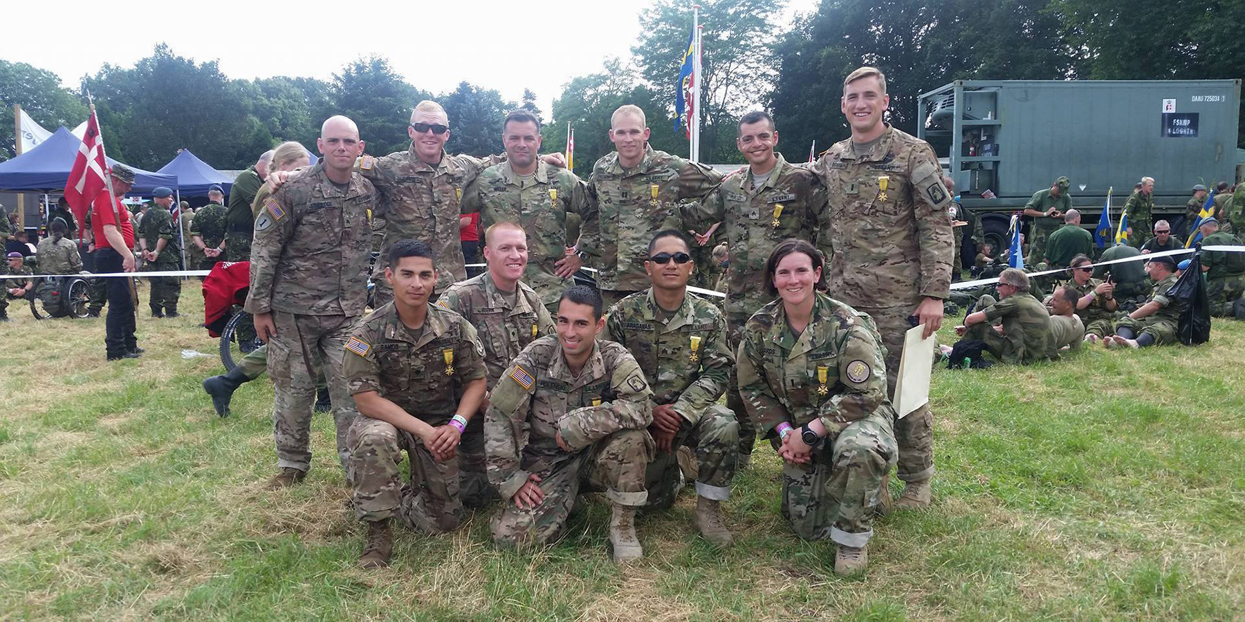 University of Iowa dental student and Army Veteran Zach Graham stands with fellow service members who went on a four-day, 100-mile march across the Netherlands